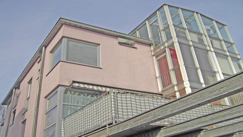 Mixed Use Residential Commercial Passive House Building: High Density Infill with Solarium